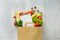 Paper bag filled with fruits and vegetables